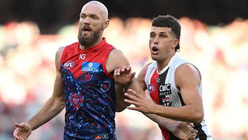 Max Gawn and Rowan Marshall contest for the ball.