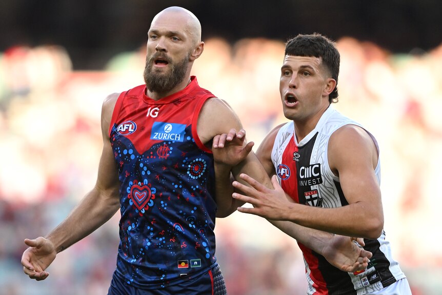 Max Gawn and Rowan Marshall contest for the ball.