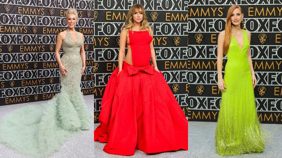 Three women in dresses on the red carpet