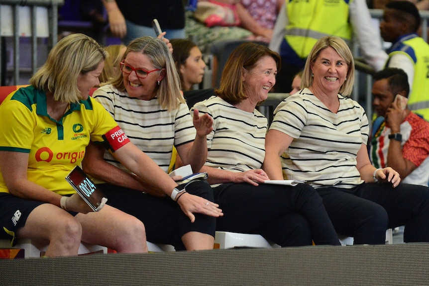 Aussie Diamonds coaches smile as they celebrate their Quad Series victory