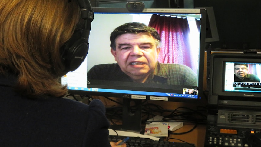 A man is pictured on a computer screen during internet interview.