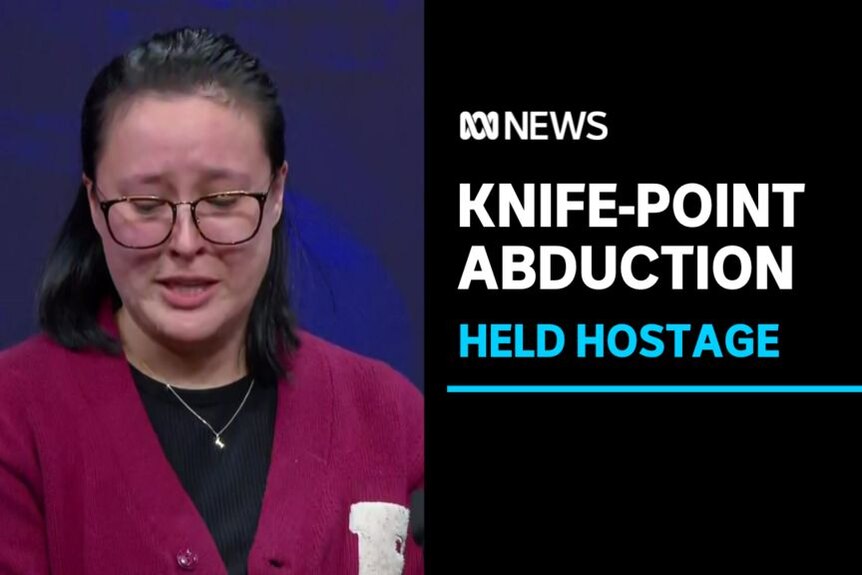 Knife-point Abduction, Held Hostage: Woman wearing glasses in a red cardigan looking down with tears in her eyes