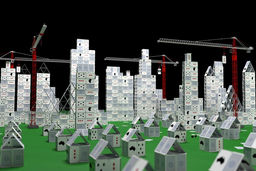 Image of a city full of both houses and towers being constructed out of cards by tall cranes.