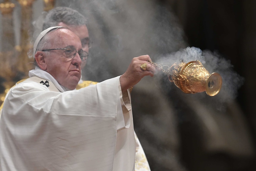 Pope Francis leads Easter vigil prayers at the Vatican, offers message ...