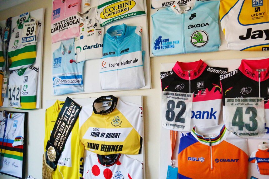 Colourful riding jerseys on the walls of Michael's old bedroom.
