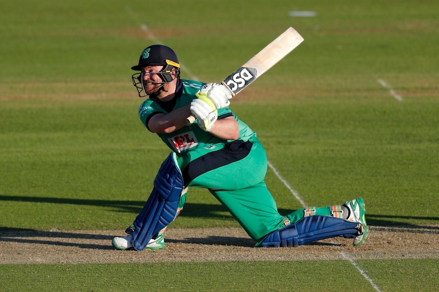 Paul Stirling hits a shot down on one knee