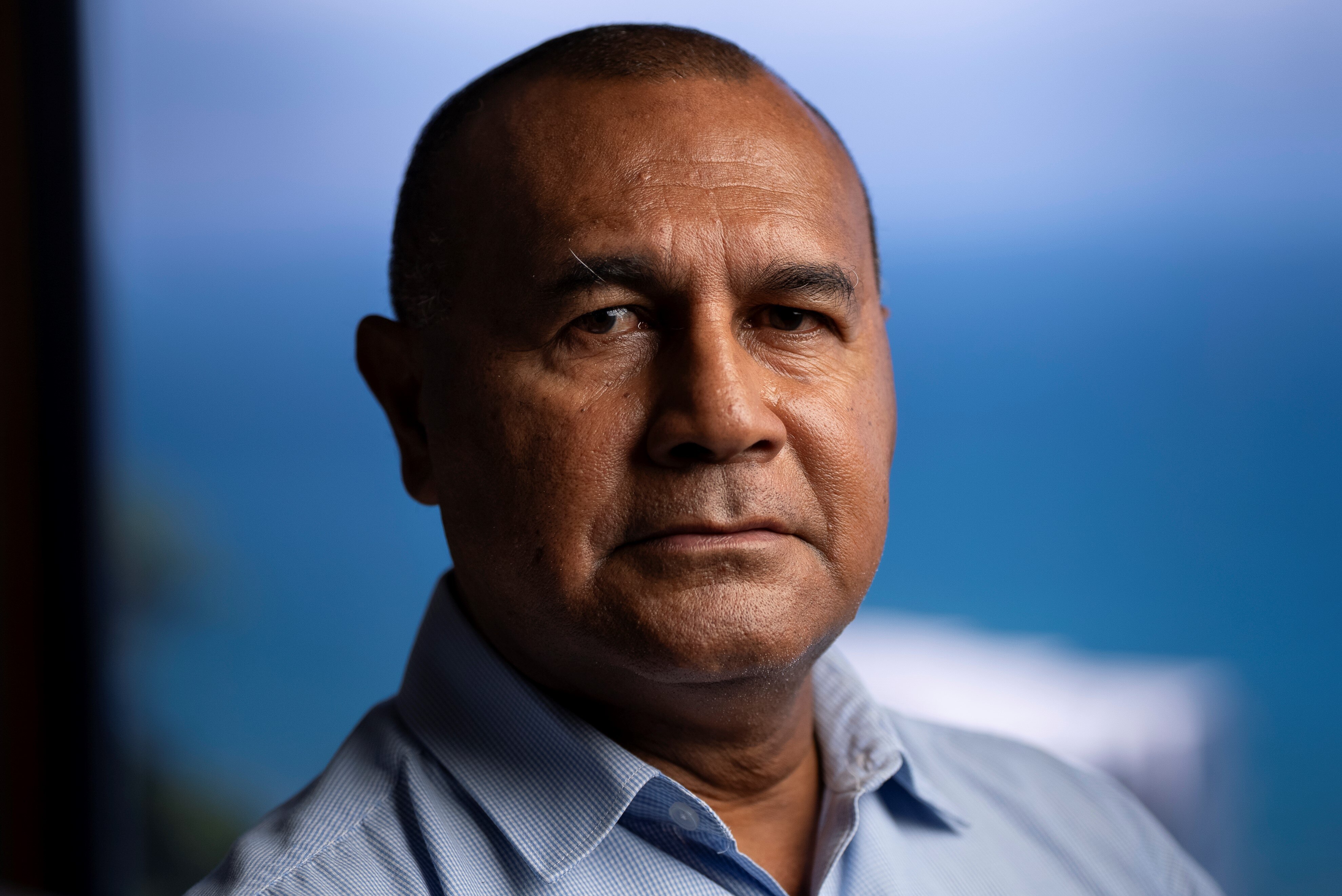 A man stares at camera.