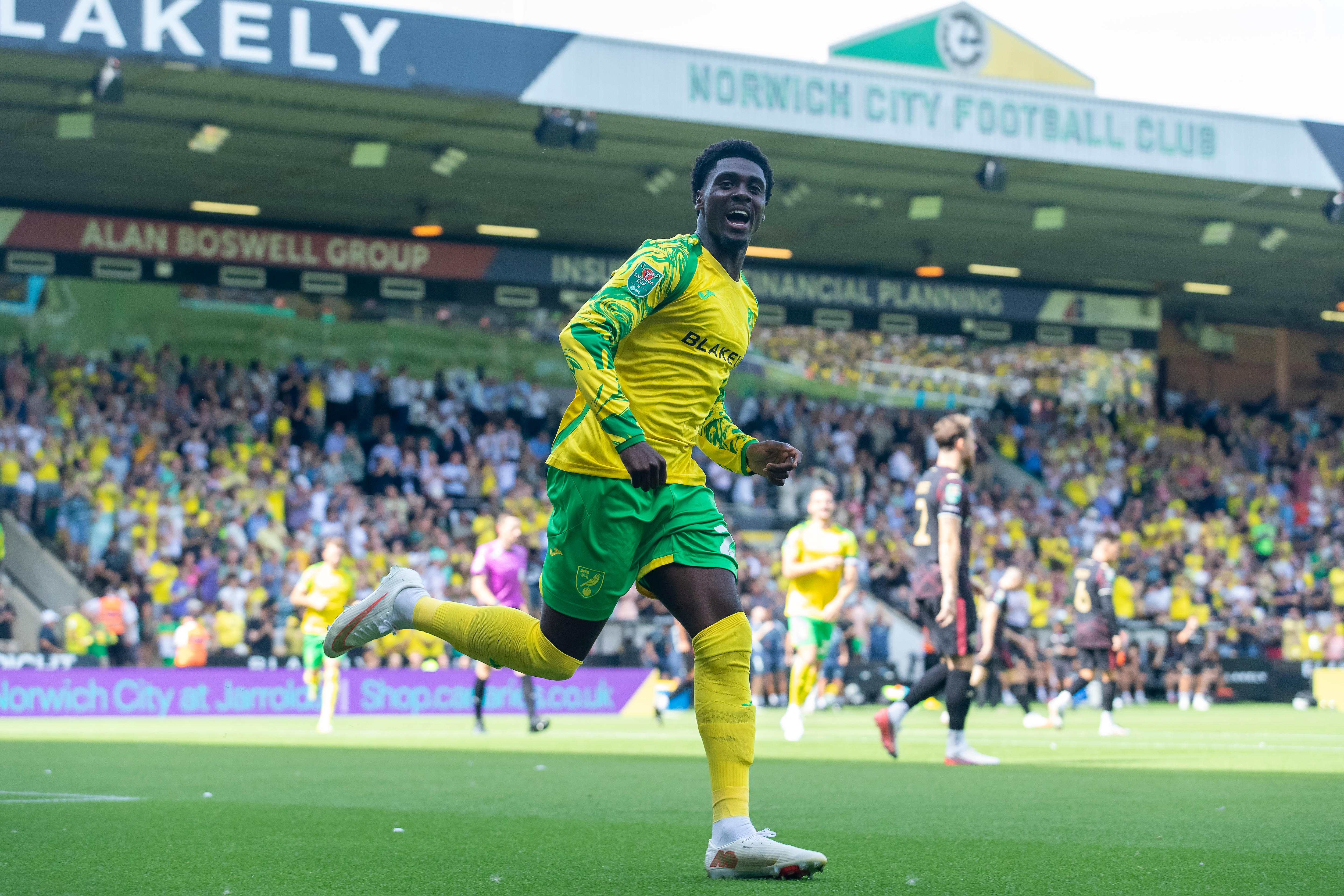 Mohamed Touré celebrates and smiles