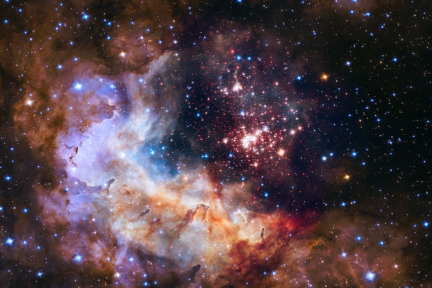 Young stars flaring to life resemble a glittering fireworks display
