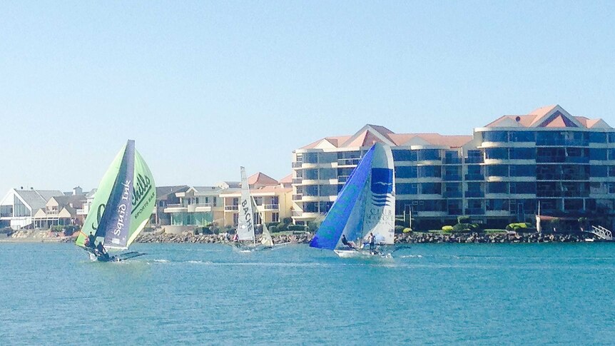 Crews on three 18-foot skiffs show their boating skills on West Lakes in Adelaide over the Easter long weekend.