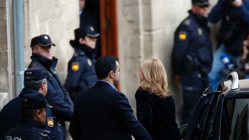 Spain's Princess Cristina arrives at a courthouse to testify before a judge on tax fraud and money-laundering charges.