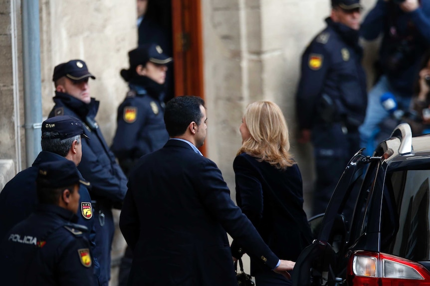 Spain's Princess Cristina arrives at a courthouse to testify before a judge on tax fraud and money-laundering charges.