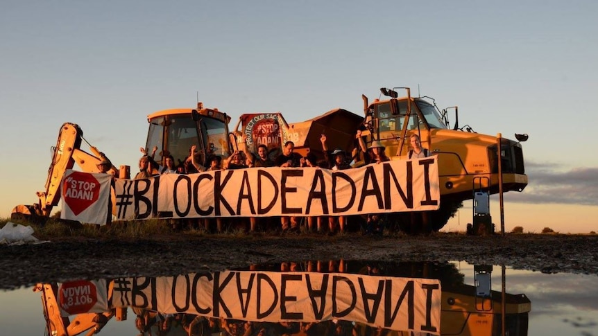 A sign saying Blockade Adani