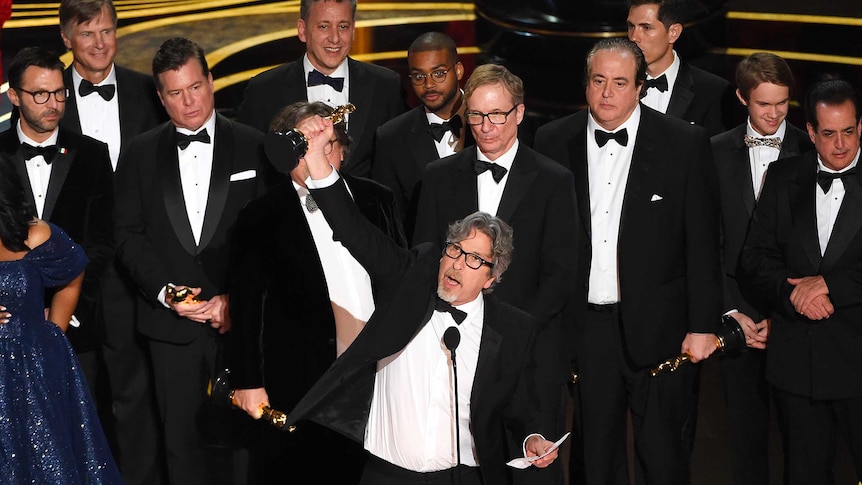 Peter Farrelly holds aloft his Oscar after Green Book won best picture at the 2019 Academy Awards.