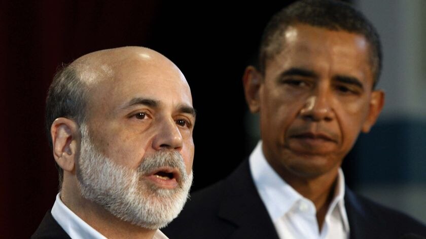 Ben Bernanke speaks to the media alongside Barack Obama