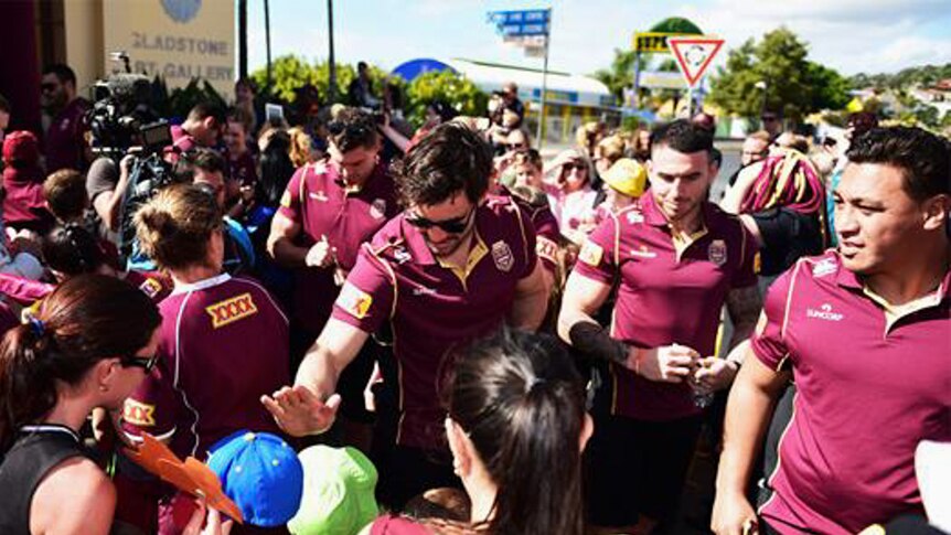 State of Origin players meeting fans and signing autographs.