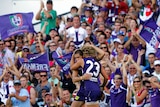 Purple haze: Fremantle came from 14 points down in the final quarter to continue its perfect start to the season.