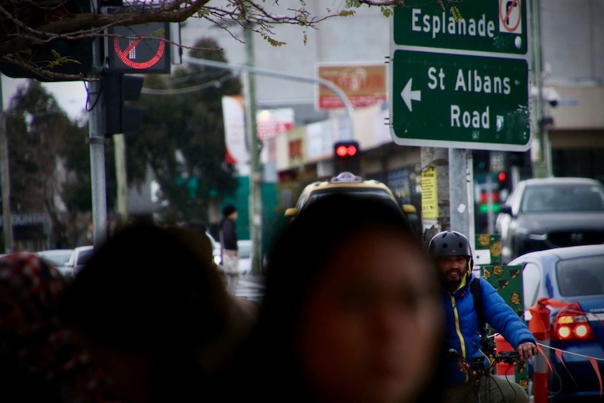 Streets in Brimbank are crowded with people and traffic.