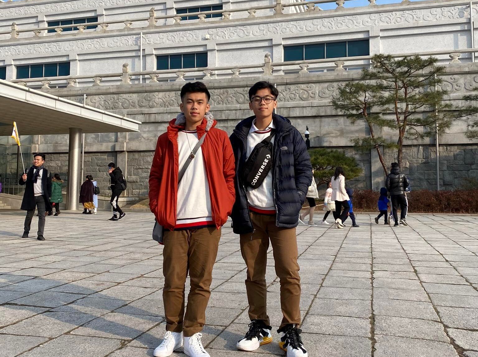 Two Vietnamese young men posing for a photo. 