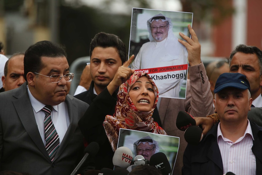 Tawakkol Karman, the Nobel Peace Prize laureate for 2011, talks to media outside the Saudi Arabia consulate in Istanbul.