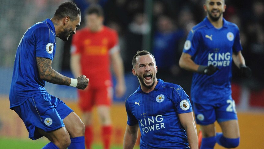 Leicester's Dannyl Drinkwater (C) celebrates after scoring against Liverpool on February 27, 2017.