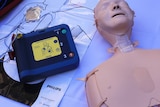 Defibrillator and a body dummy.