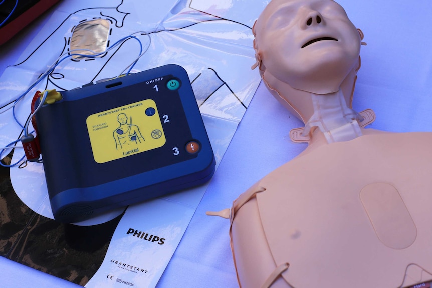 Defibrillator and a body dummy.