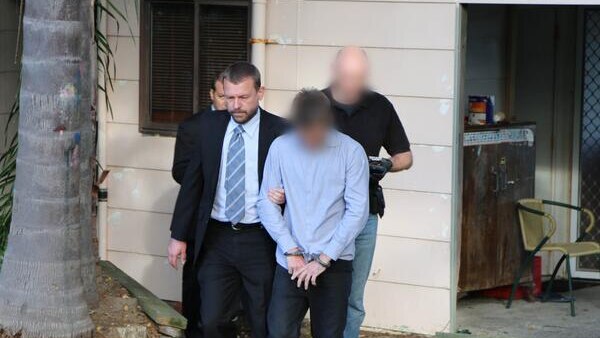 Detectives from strike force Knead arresting a man on the state's Central Coast yesterday.