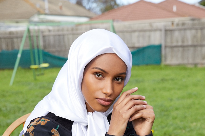 Hanan Ibrahim sitting on a chair