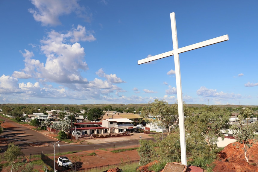 A large cross on a hill overlooking the town of Tennant Creek. 