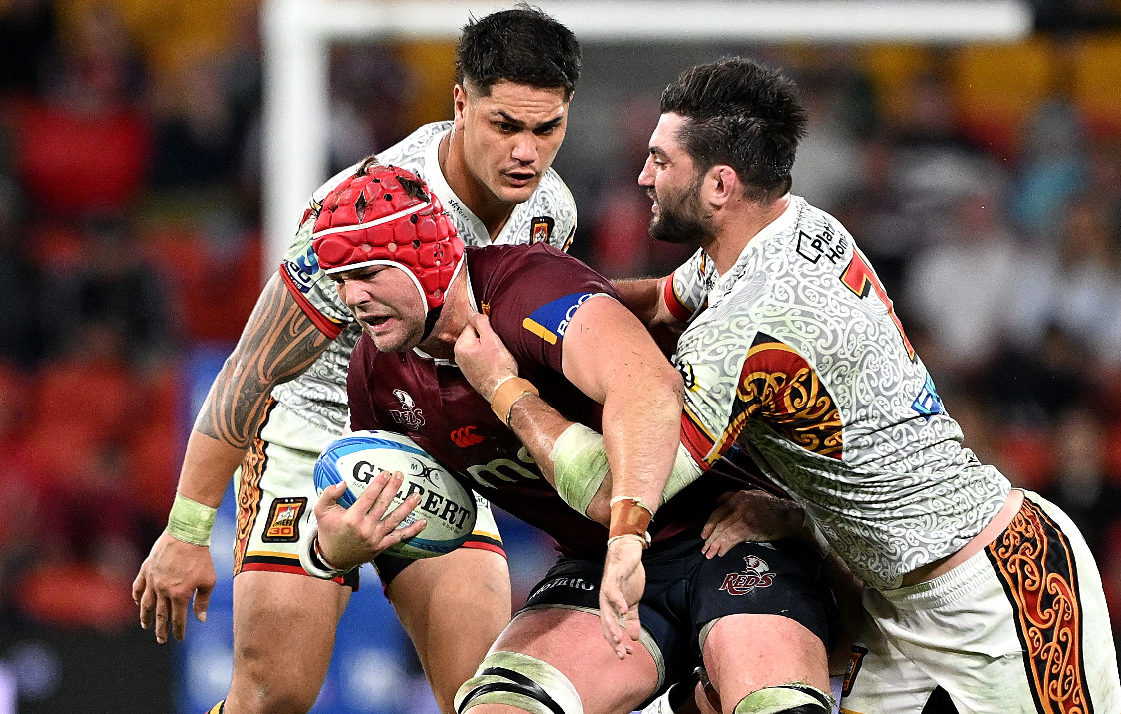 Harry Wilson carrying the ball for the Reds against the Chiefs.