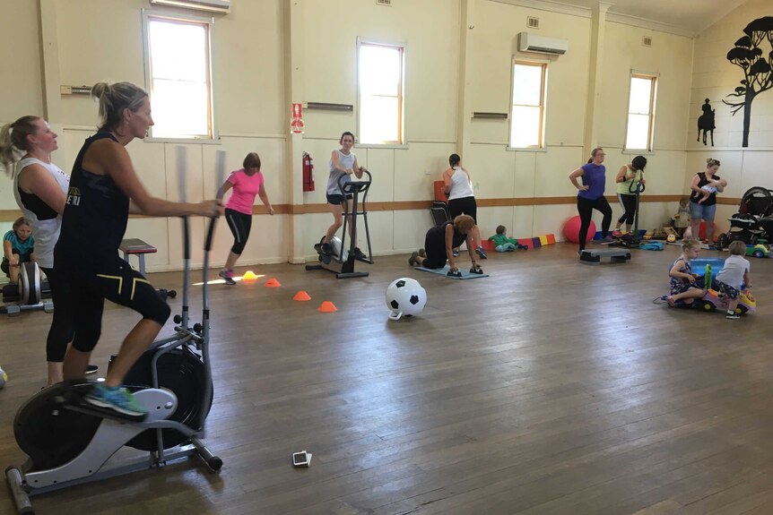 Manangatang women work through their circuit training.