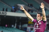 Queensland Maroons player Ben Hunt waves to the Adelaide Oval crowd after State of Origin I.