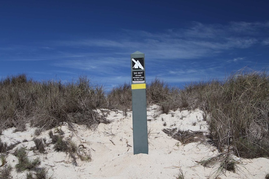 sign on beach