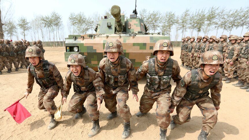 Soldiers of China's People's Liberation Army during a military promotional event.