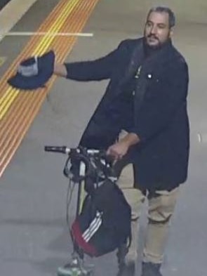 Police release a photo of a man they are searching for after a suspicious device was found at North Melbourne train station.