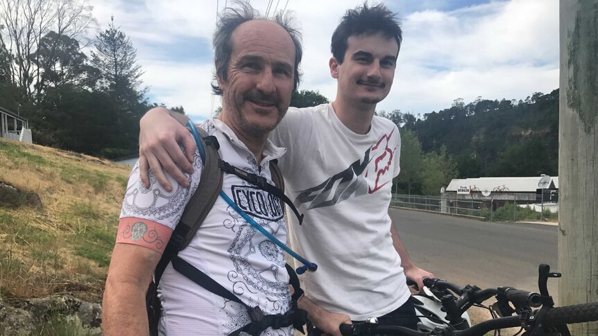 Mountain bikers Charles Finney and his son Reid