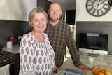 Joanne and Stephen Grosser stand in their kitchen in their home near Ipswitch, Queensland