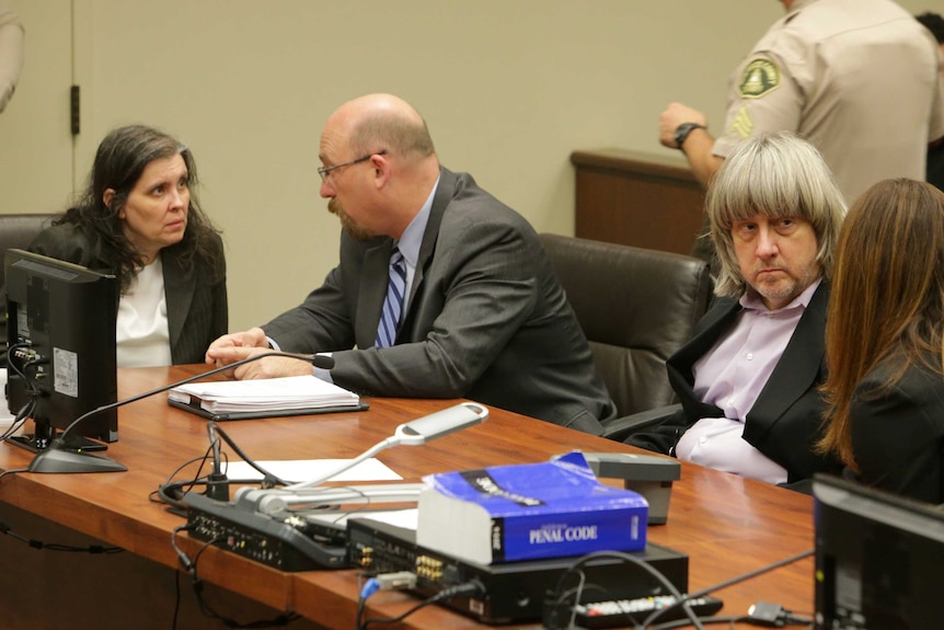 Accused torturers Louise Turpin and David Turpin speak with their lawyers in court