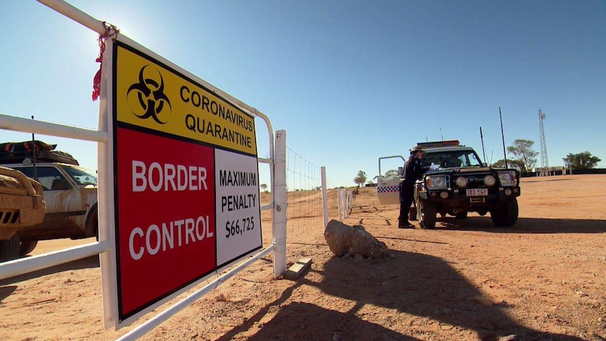 Police staff a border checkpoint at Barringun in south-west Queensland, August 2020