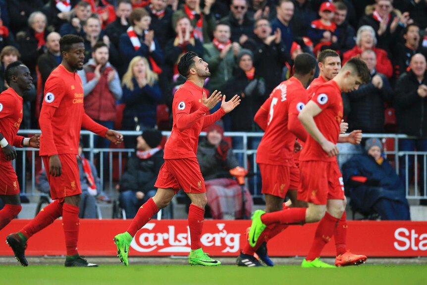 Liverpool's Emre Can (C), celebrates his goal against Burnley in the Premier League at Anfield.