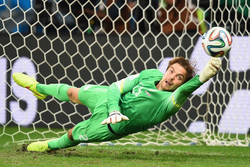 Dutch keeper Tim Krul saves a penalty from Costa Rica's Michael Umana.