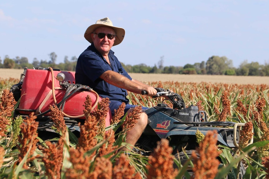 Wayne Newton rides a 4wd on his qld property