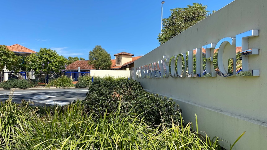 A wall outside a school with the words "Saint Stephen's College" written on it in gleaming letters.