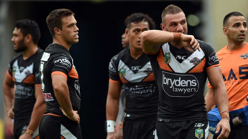 Robbie Farah grimaces during Wests Tigers loss