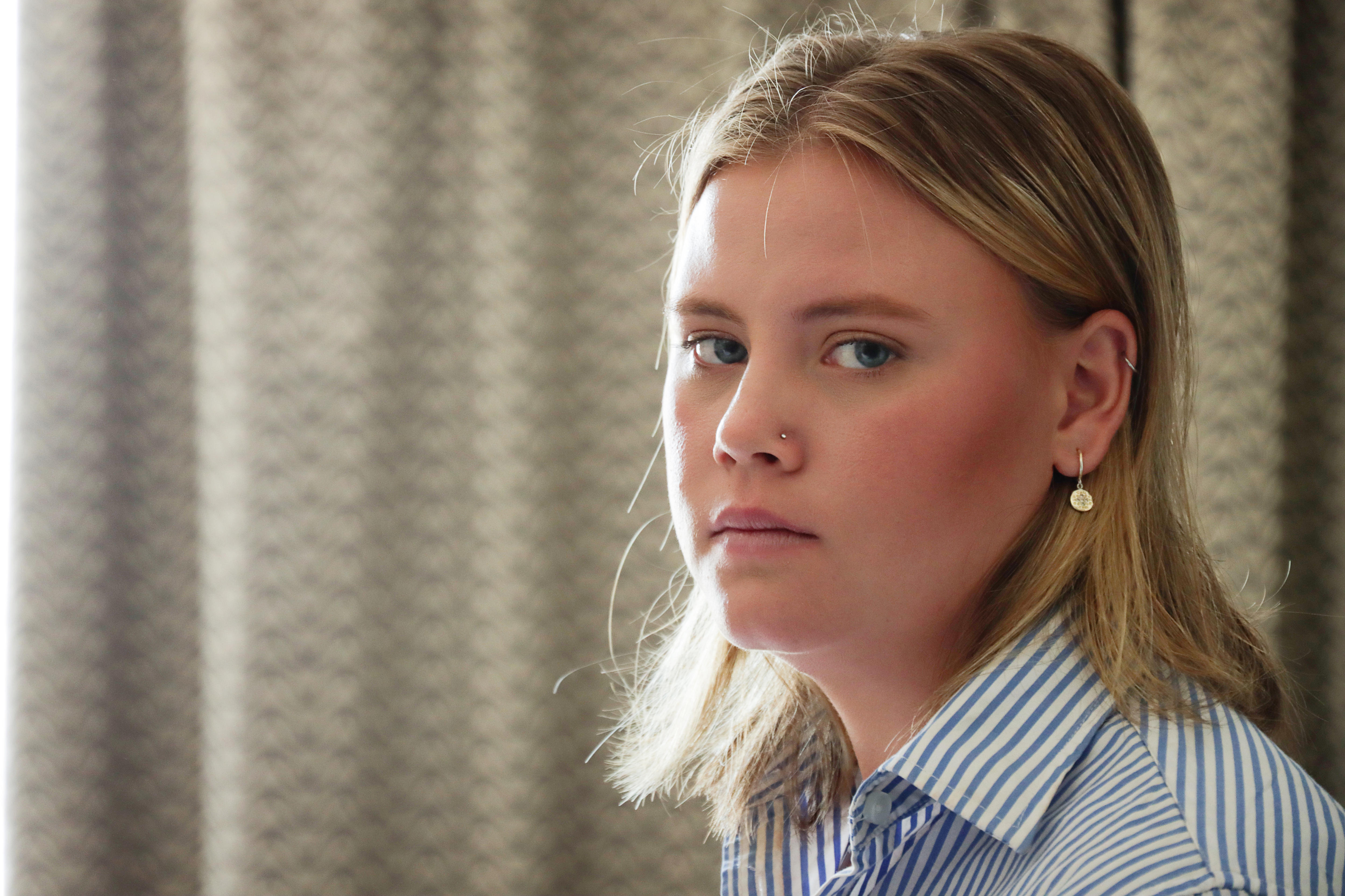 Mia Morris looks at the camera from close range.