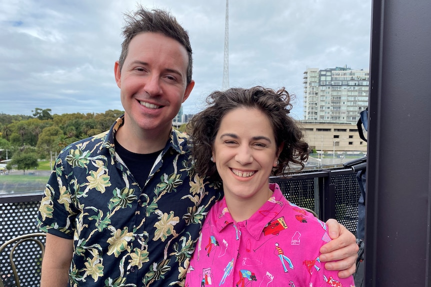 Nath Valvo and Jude Perl wearing button-up shirts and smiling at the camera.