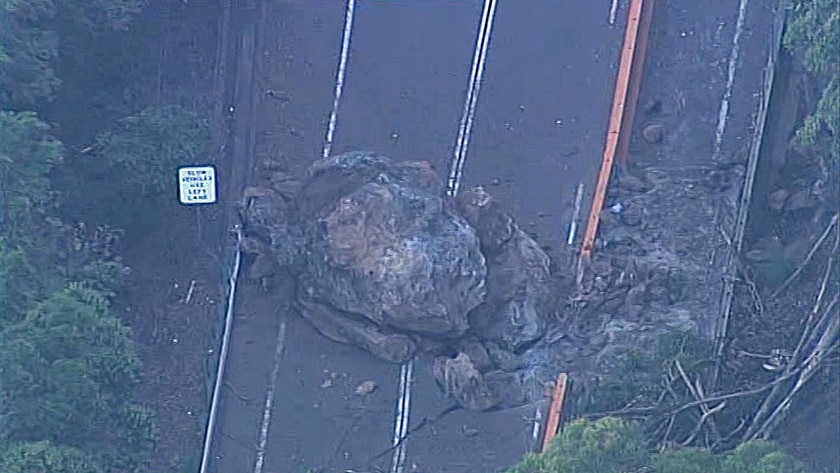 A 300-tonne boulder that fell at Gap Creek Bridge on the Cunningham Highway, near Warwick.