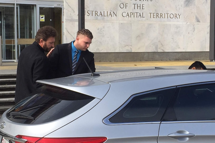Danny Klobucar gets into a car in front of the court building.