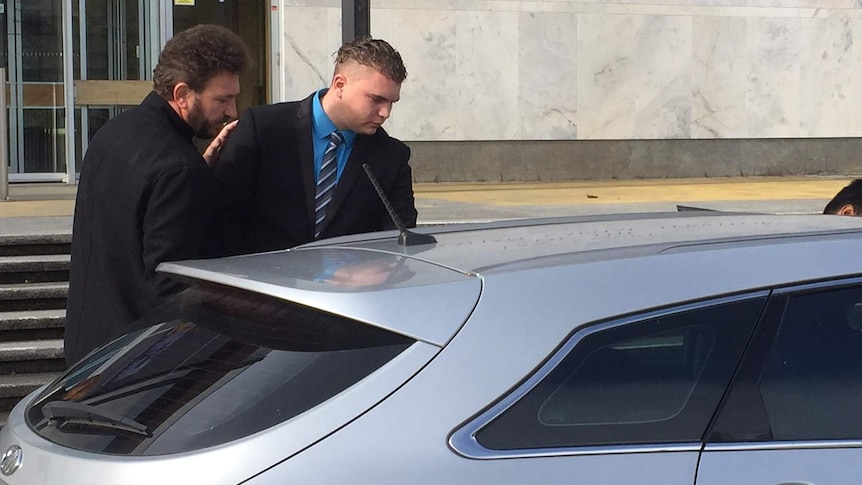 Danny Klobucar gets into a car in front of the court building.